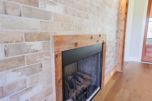 details featuring hardwood / wood-style flooring