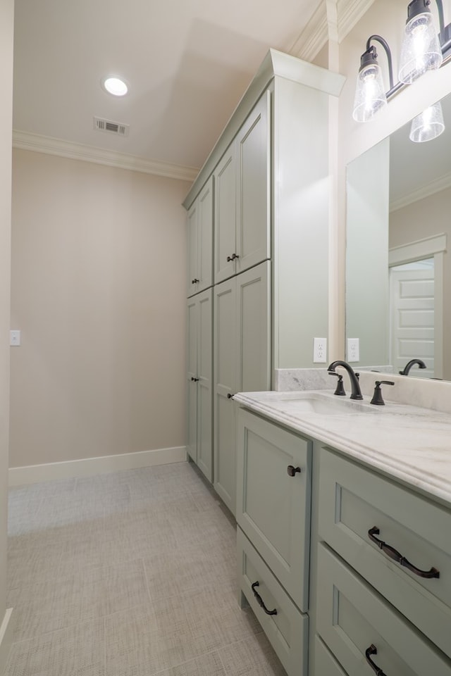 bathroom featuring vanity and crown molding