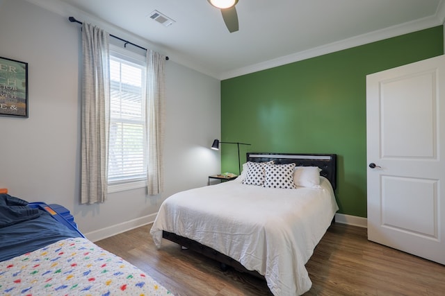 4310 Old Quitman Hwy, Valdosta, GA 31601 - bedroom with ornamental molding, baseboards, wood finished floors, and a ceiling fan