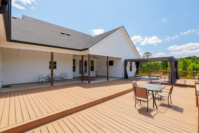 4310 Old Quitman Hwy, Valdosta, GA 31601 - wooden deck with outdoor dining space and a ceiling fan