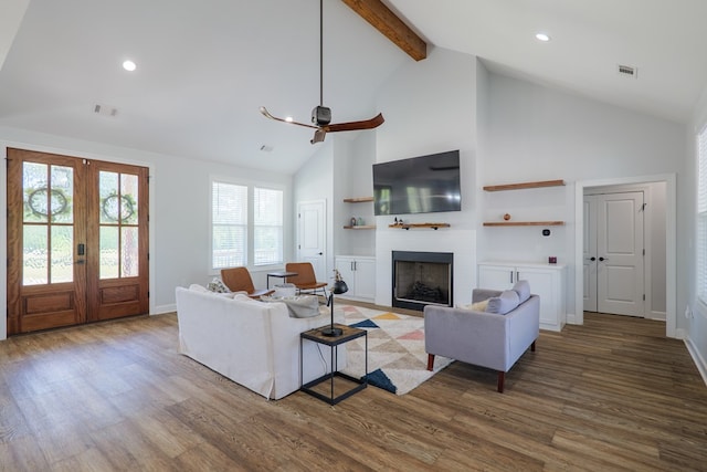 4310 Old Quitman Hwy, Valdosta, GA 31601 - living room featuring high vaulted ceiling, a fireplace, wood finished floors, beamed ceiling, and ceiling fan