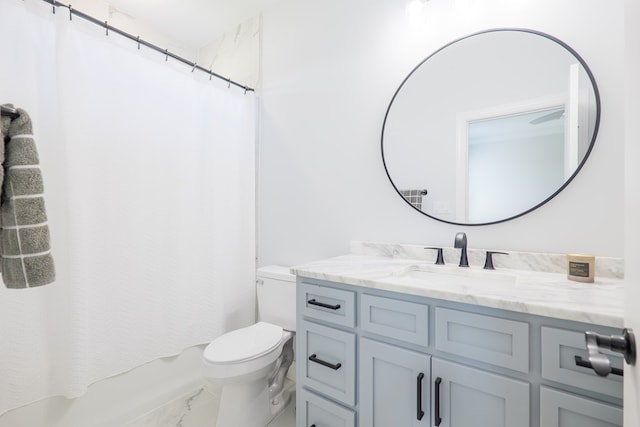 4310 Old Quitman Hwy, Valdosta, GA 31601 - bathroom featuring marble look tiles, toilet, and vanity