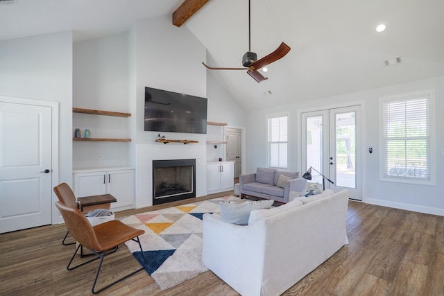 4310 Old Quitman Hwy, Valdosta, GA 31601 - living room featuring ceiling fan, beam ceiling, high vaulted ceiling, wood finished floors, and a fireplace