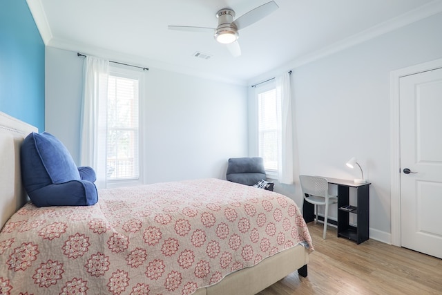 4310 Old Quitman Hwy, Valdosta, GA 31601 - bedroom with crown molding, light wood-type flooring, ceiling fan, and baseboards