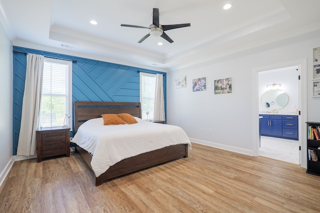 4310 Old Quitman Hwy, Valdosta, GA 31601 - bedroom with a raised ceiling, light wood-type flooring, baseboards, recessed lighting, and crown molding