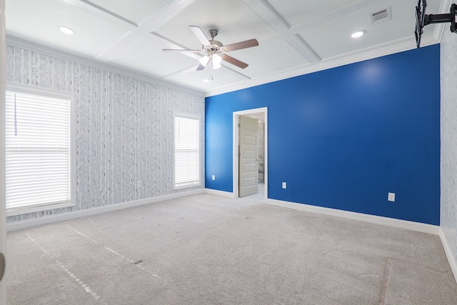 empty room featuring carpet flooring, coffered ceiling, baseboards, and ornamental molding