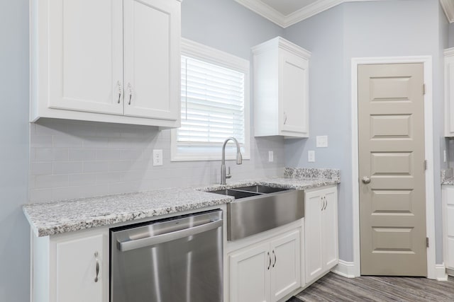 kitchen with a sink, white cabinets, crown molding, decorative backsplash, and dishwasher