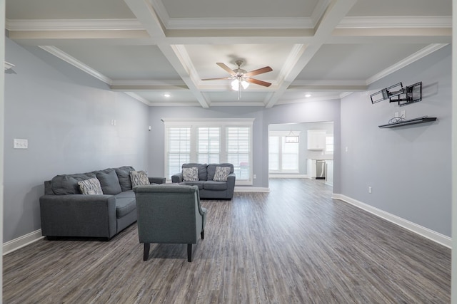 living room featuring dark wood-type flooring, a ceiling fan, and baseboards