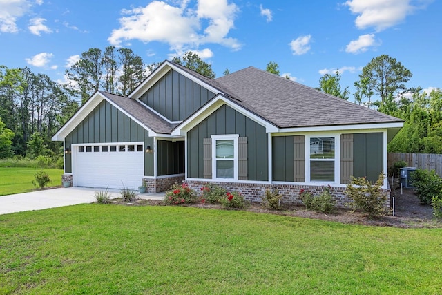 3638 Seedling Ln, Valdosta, GA 31601 - view of front facade featuring board and batten siding, an attached garage, roof with shingles, driveway, and cooling unit