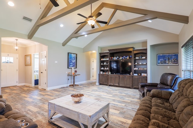 living room featuring beam ceiling, light wood-type flooring, high vaulted ceiling, and ceiling fan