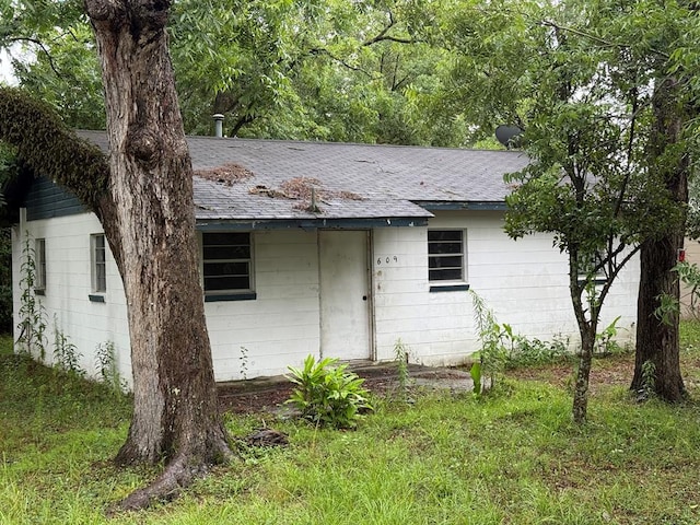 609 W Sixth St, Adel, GA 31620 - view of property exterior featuring a shingled roof