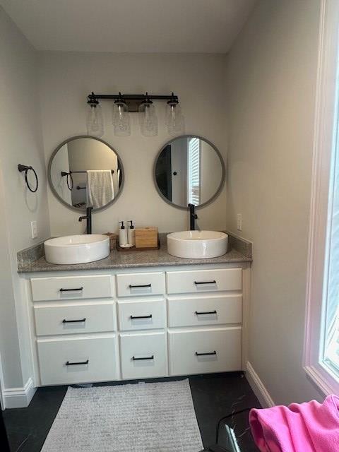 35 Tyler Rd, Naylor, GA 31641 - bathroom with baseboards and double vanity