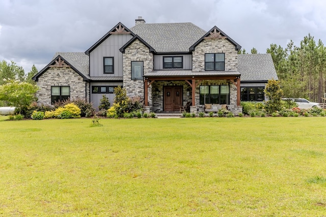 35 Tyler Rd, Naylor, GA 31641 - craftsman house featuring a standing seam roof, stone siding, and a front yard