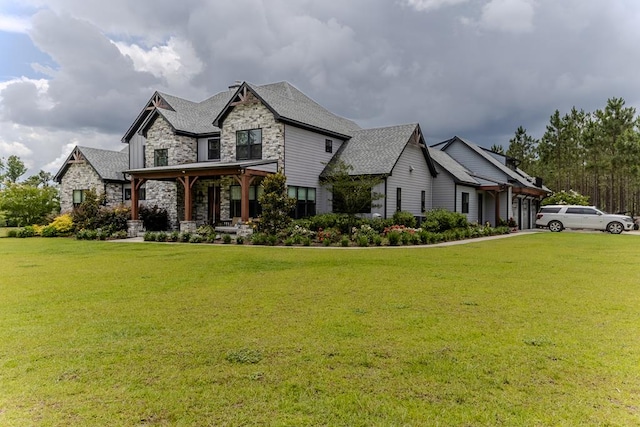 35 Tyler Rd, Naylor, GA 31641 - craftsman inspired home featuring stone siding, a front lawn, and roof with shingles