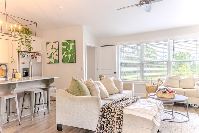 35 Tyler Rd, Naylor, GA 31641 - living room with light wood-style flooring, ceiling fan, a chandelier, and baseboards