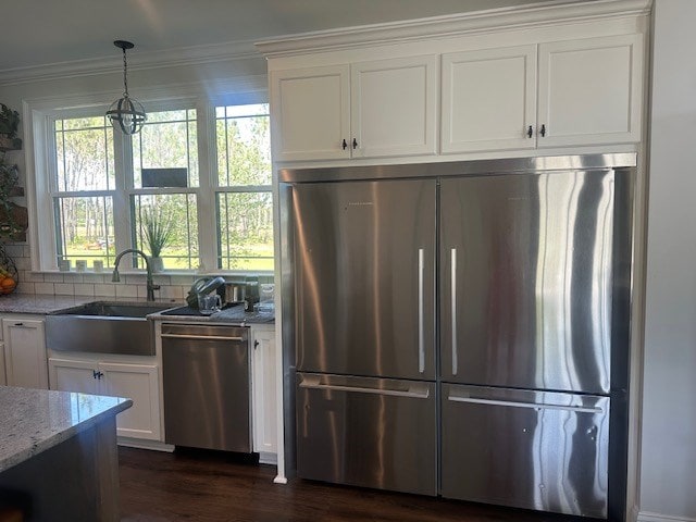 35 Tyler Rd, Naylor, GA 31641 - kitchen featuring stainless steel appliances, a sink, light stone counters, white cabinets, and crown molding