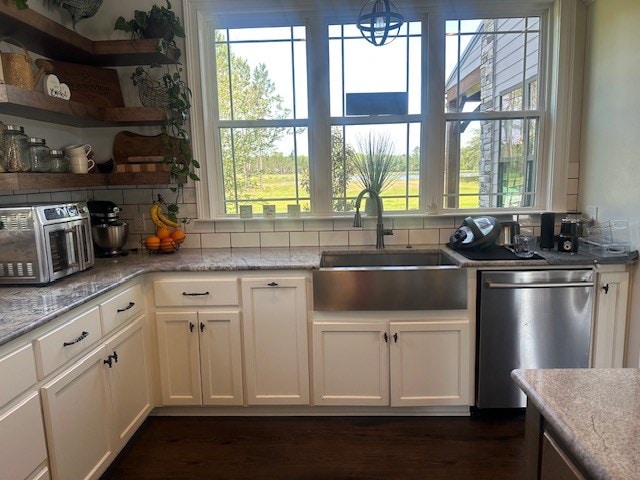 35 Tyler Rd, Naylor, GA 31641 - kitchen featuring dishwasher, a sink, healthy amount of natural light, and white cabinets