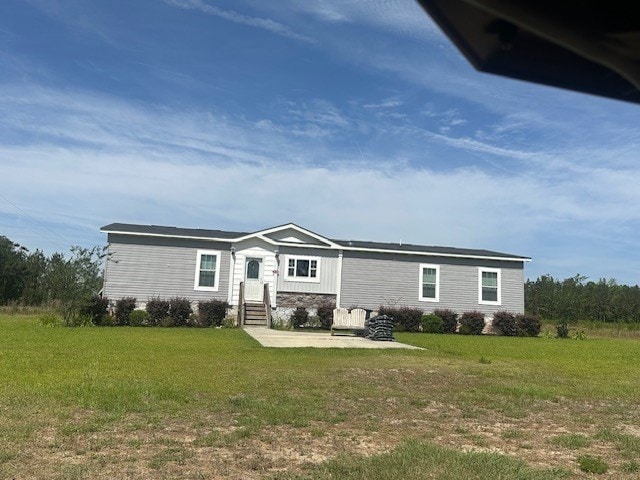 35 Tyler Rd, Naylor, GA 31641 - rear view of house featuring a lawn, entry steps, and a patio