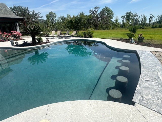 35 Tyler Rd, Naylor, GA 31641 - outdoor pool featuring a yard, a patio, and view of wooded area