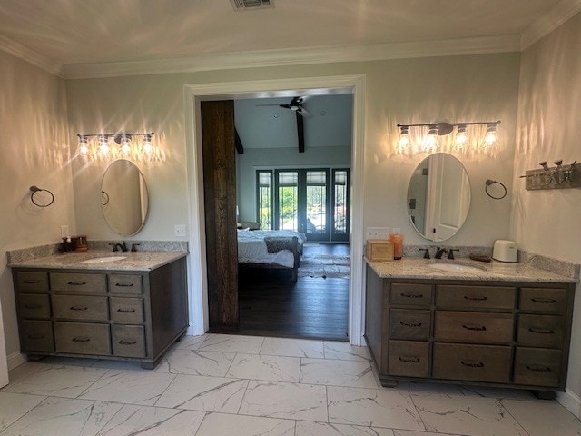 35 Tyler Rd, Naylor, GA 31641 - bathroom with marble finish floors, two vanities, connected bathroom, and ornamental molding