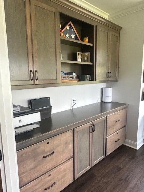 35 Tyler Rd, Naylor, GA 31641 - bar featuring crown molding, dark wood-style flooring, and baseboards