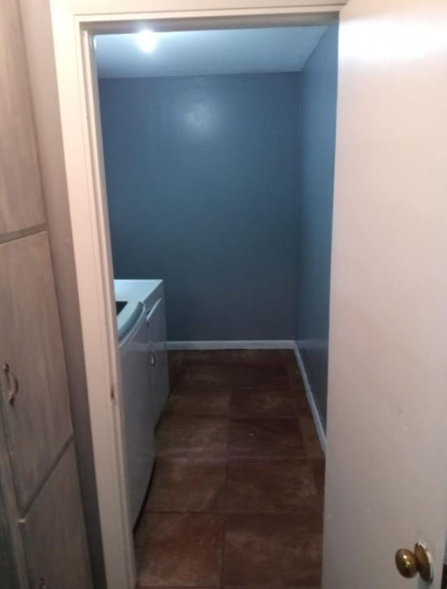 washroom featuring independent washer and dryer