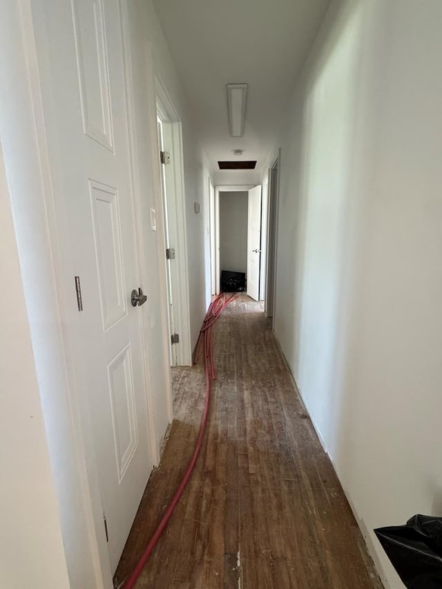 corridor with wood finished floors