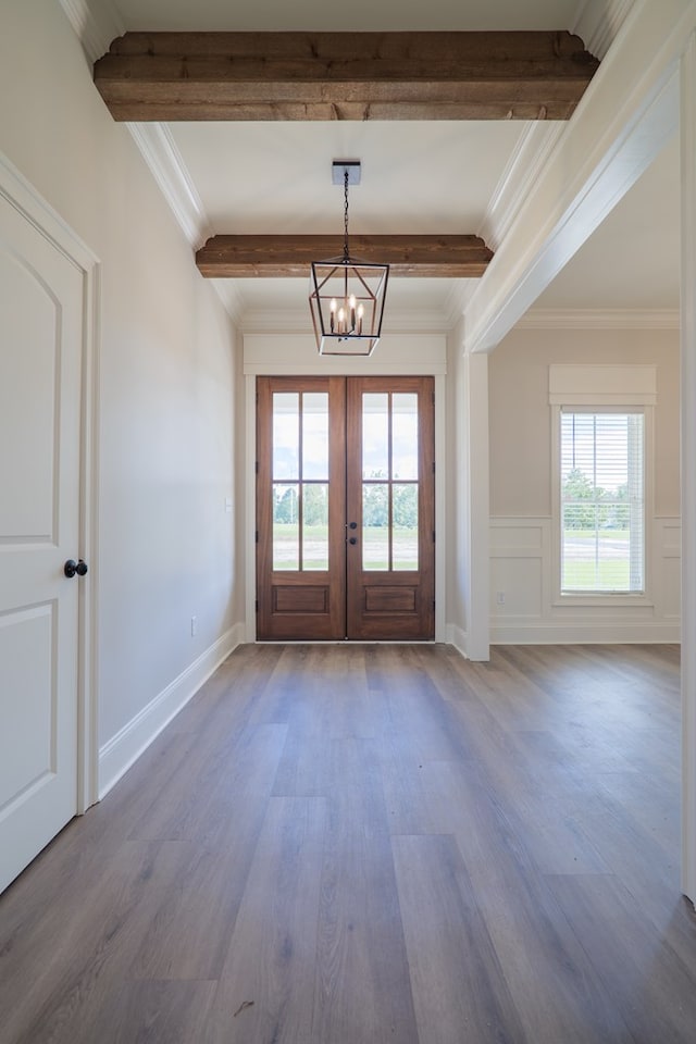 3376 Bemiss Knights Academy Rd, Valdosta, GA 31605 - entryway with beamed ceiling, wood finished floors, a chandelier, french doors, and crown molding