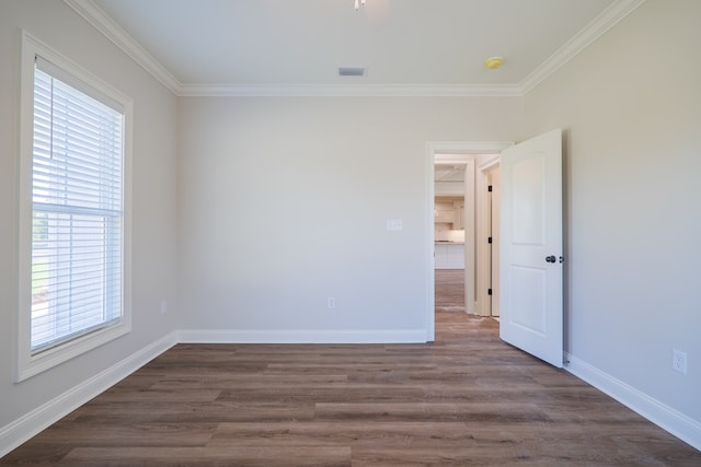 3376 Bemiss Knights Academy Rd, Valdosta, GA 31605 - empty room featuring ornamental molding and dark wood-style floors
