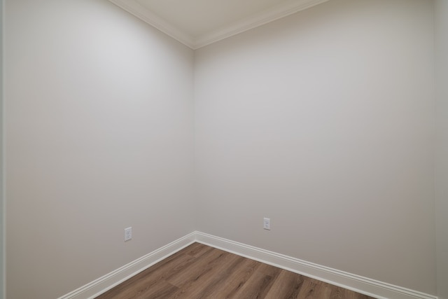 3376 Bemiss Knights Academy Rd, Valdosta, GA 31605 - spare room featuring dark wood-style floors and ornamental molding