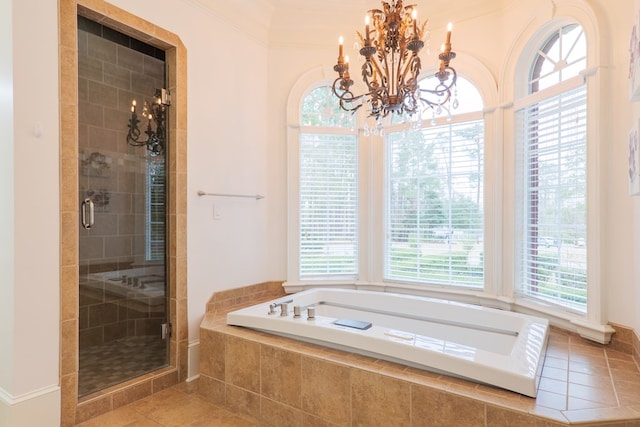 bathroom featuring a notable chandelier, crown molding, tile patterned floors, and independent shower and bath