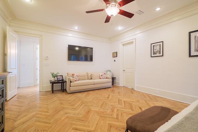 living room with ceiling fan, ornamental molding, and light parquet flooring