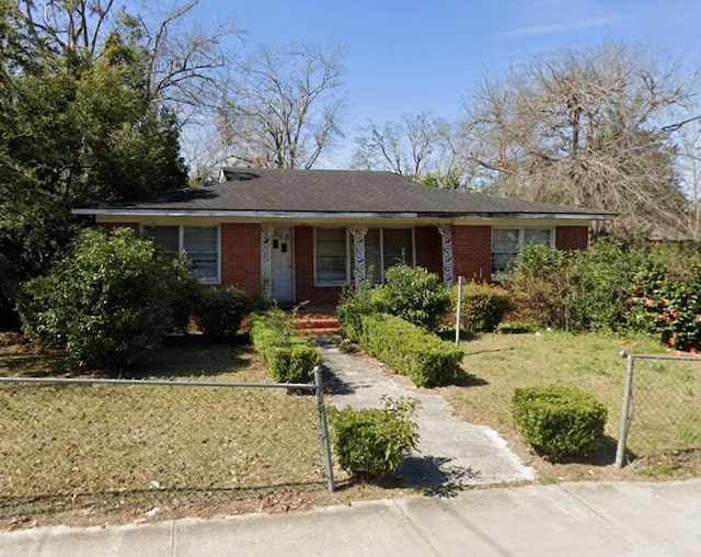 306 N Troup St Unit 6, Valdosta, GA 31601 - single story home with brick siding, a front lawn, and fence