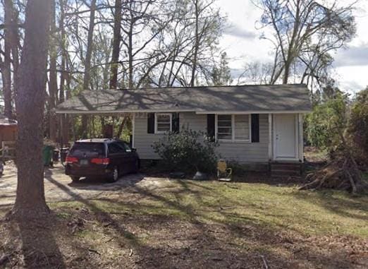 306 N Troup St Unit 6, Valdosta, GA 31601 - single story home with a carport, entry steps, and a front yard