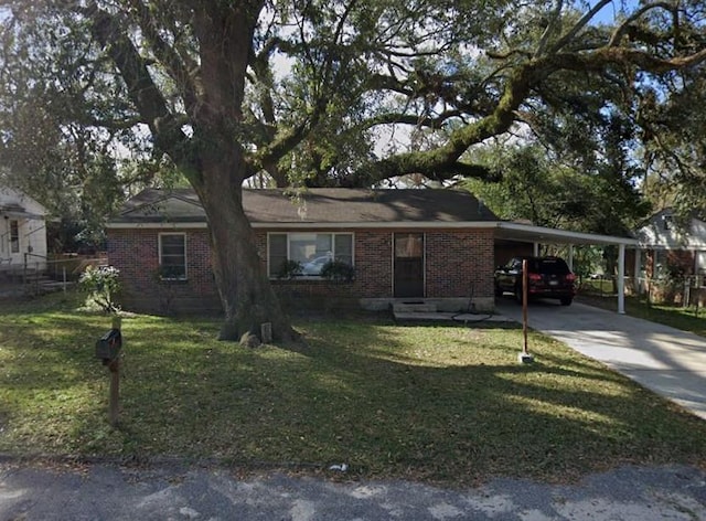 306 N Troup St Unit 6, Valdosta, GA 31601 - single story home with concrete driveway, a front lawn, brick siding, and a carport