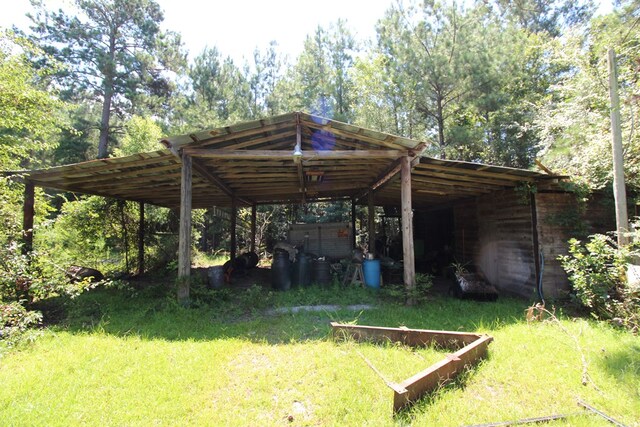 exterior space with a carport