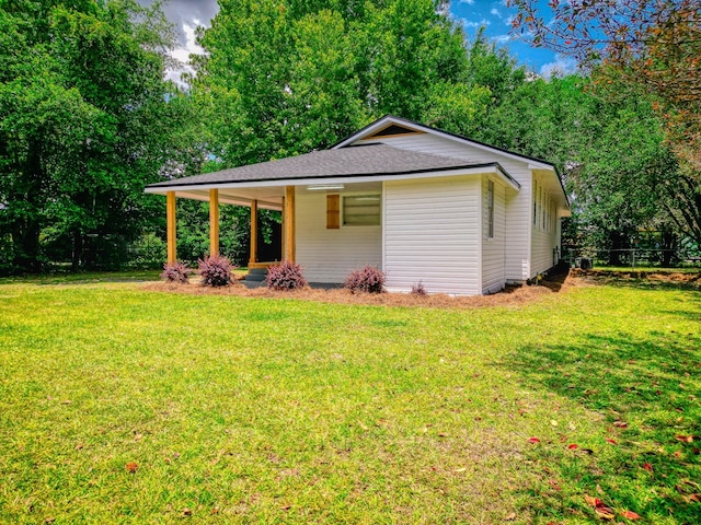 exterior space with a front lawn