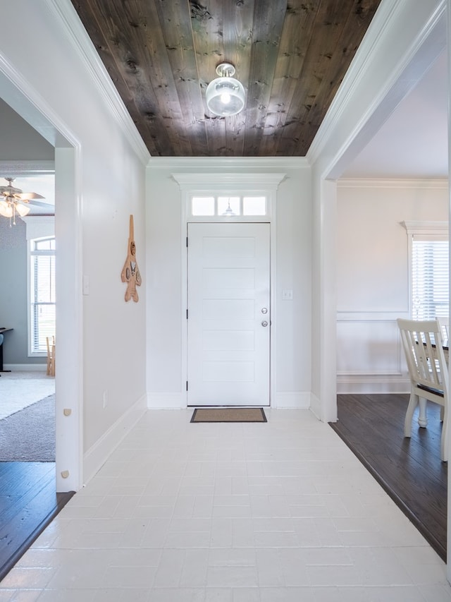 3956 Crusader Ct, Valdosta, GA 31605 - foyer entrance with wooden ceiling, healthy amount of natural light, ornamental molding, and a ceiling fan