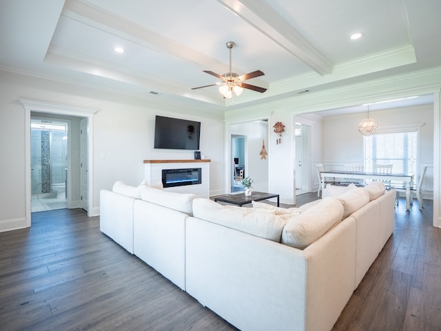 3956 Crusader Ct, Valdosta, GA 31605 - living area featuring ornamental molding, a glass covered fireplace, wood finished floors, a ceiling fan, and beamed ceiling