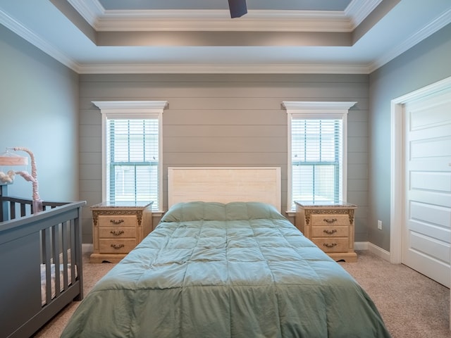 3956 Crusader Ct, Valdosta, GA 31605 - bedroom featuring light carpet, a raised ceiling, multiple windows, and ornamental molding