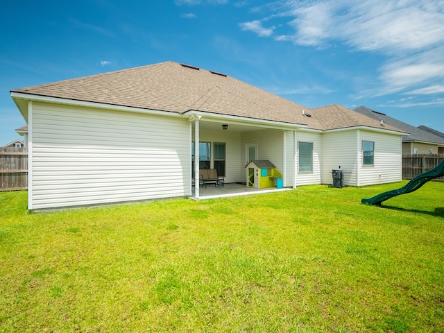 3956 Crusader Ct, Valdosta, GA 31605 - rear view of house with a patio area and a shingled roof