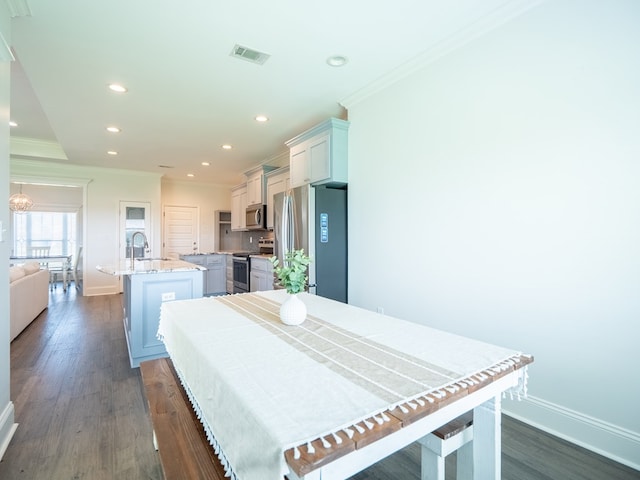 3956 Crusader Ct, Valdosta, GA 31605 - dining space with crown molding, recessed lighting, and dark wood-style flooring