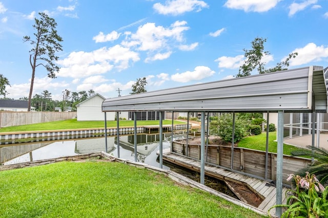561 Sevilla Spring Cir, Lake Park, GA 31636 - dock featuring boat lift and a water view