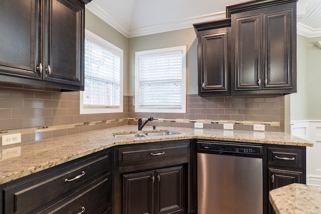 kitchen with dark brown cabinetry, dishwasher, sink, and ornamental molding