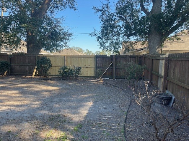 rear view of house featuring a patio area