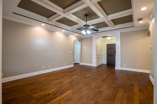 spare room featuring ceiling fan, ornamental molding, coffered ceiling, and beam ceiling