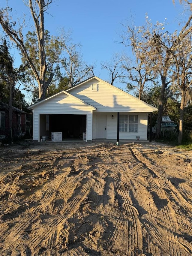 single story home featuring a garage