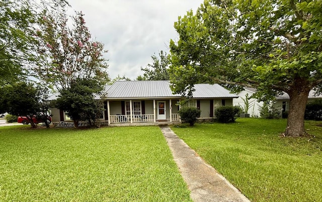 325 Jennifer Cir, Valdosta, GA 31605 - single story home featuring covered porch, a front lawn, and a metal roof
