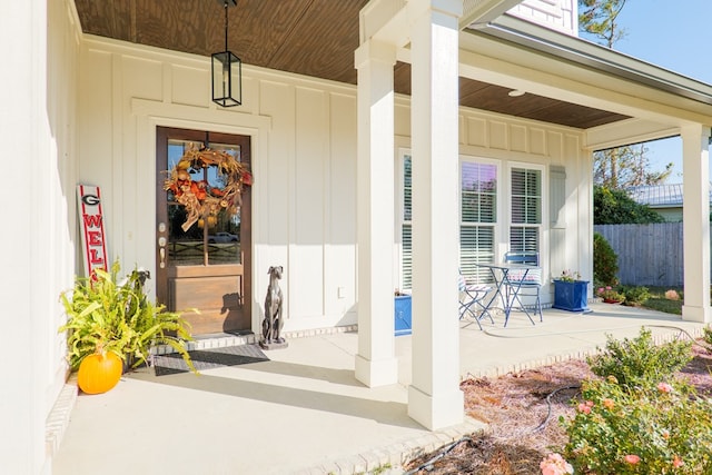 property entrance with covered porch