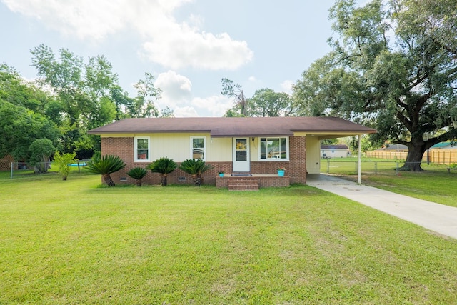 5209 Sequani Cir, Lake Park, GA 31636 - ranch-style home featuring brick siding, an attached carport, concrete driveway, and crawl space